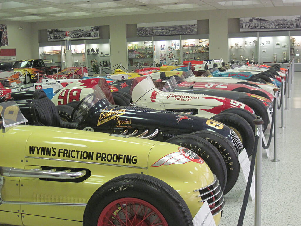Vintage Indy race cars in a row