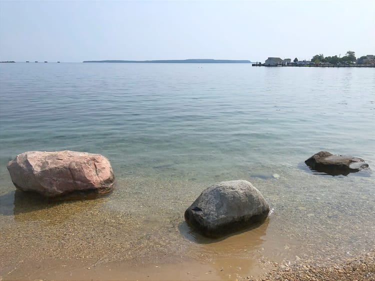Rocks in shallows along shoreline