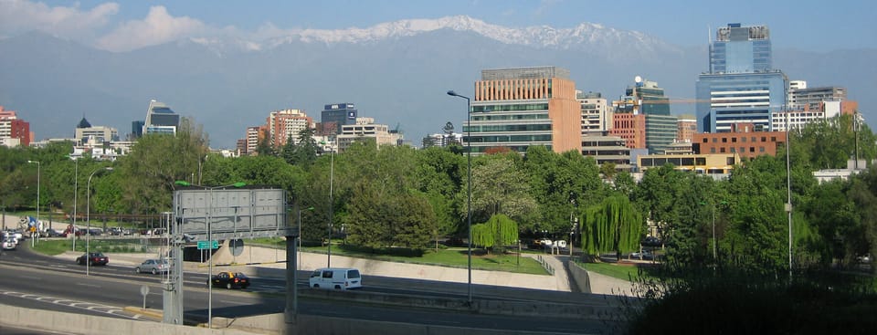 View from the Sheraton Santiago of tall buildings and the snow-capped mountains beyond