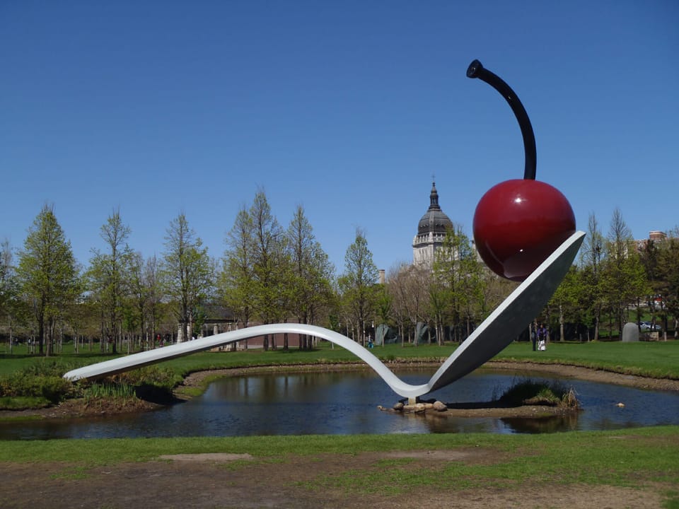 Minneapolis artwork with a cherry balanced on a spoon