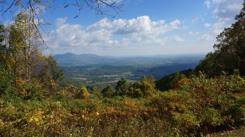 Panorama of a valley and distant mountains from a roadside pulloff in the Blue Ridge Mountains
