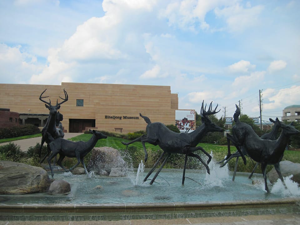 Deer sculptures racing across a fountain at the Eiteljorg Museum of American Indians and Western Art